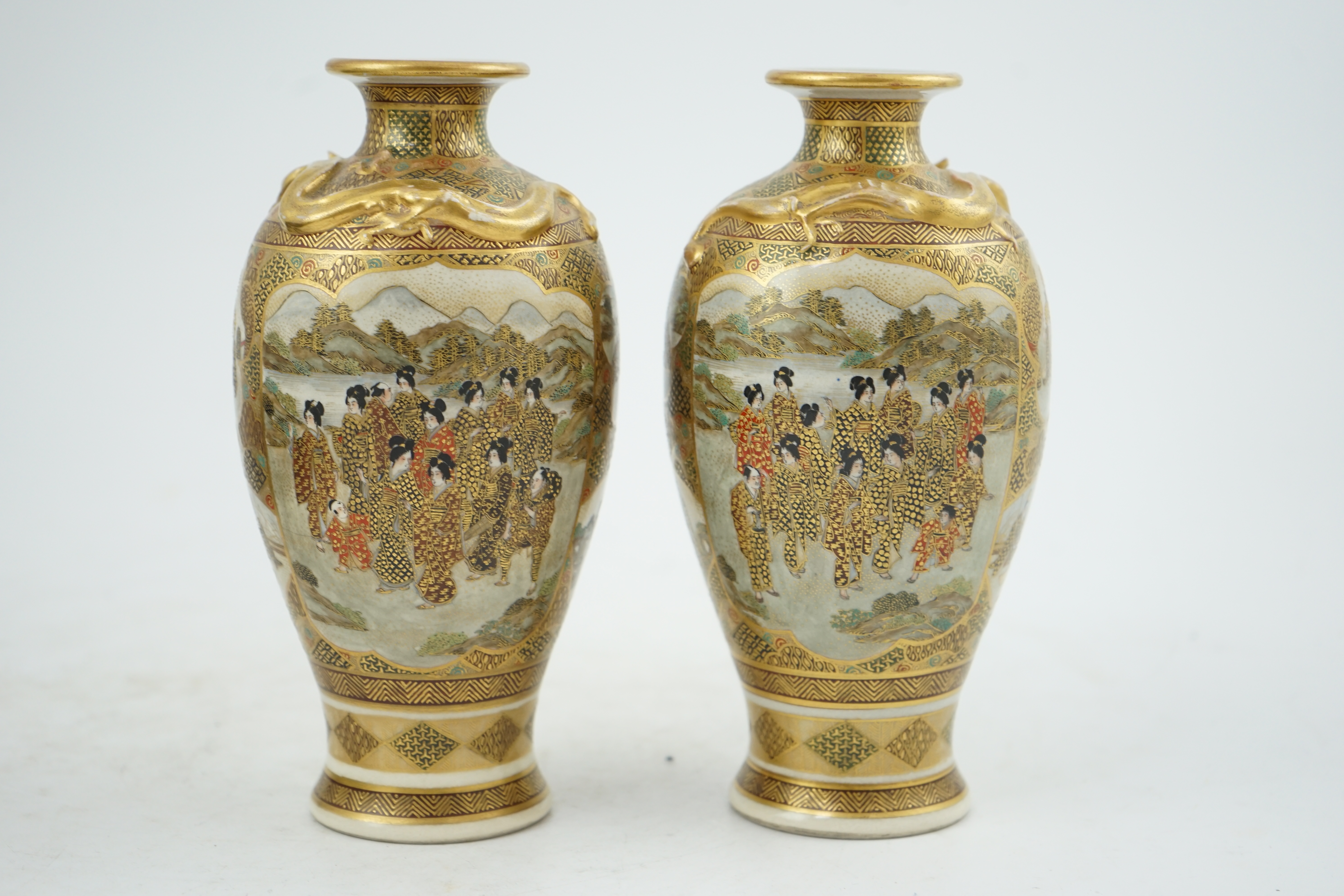 A pair of Japanese Satsuma 'dragon' vases, Meiji period